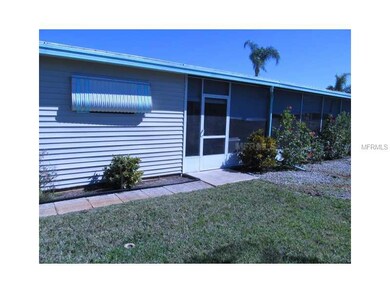 Lanai - ANOTHER ENTRANCE TO LARGE SCREENED LANAI OFF OF CARPORT