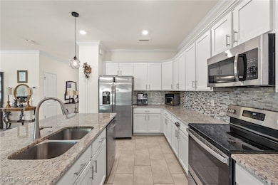 Kitchen featuring stainless steel appliances, a do