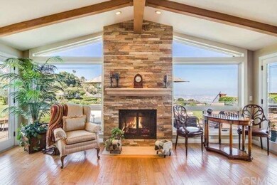 Family room with natural quartz stone fireplace an