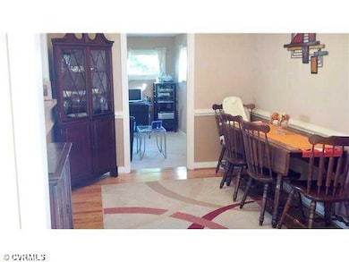 Dining Room - Beautiful Hardwood Flooring throughout this great home...glimpse of the Family Room!