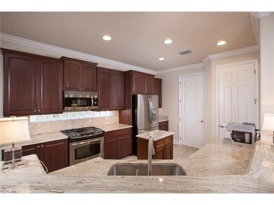 Kitchen with granite countertops, stainless steel 