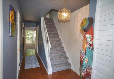 FOYER ENTRY AND RECESSED STAIRWAY