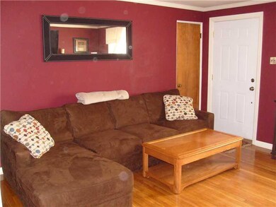 Living Room. Hall closet at entry with attic access.