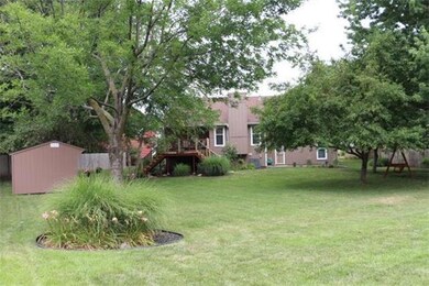 Beautiful landscaped backyard with storage shed/pl