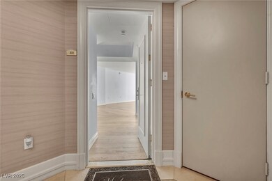 Corridor with view into condo