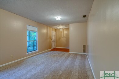Formal front room is awaiting your furniture and a
