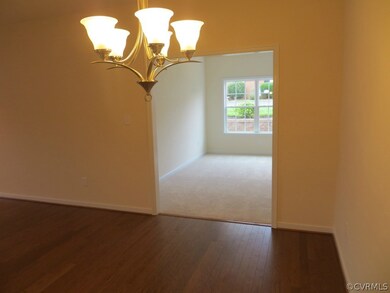 Spacious sunroom off of the dining area brings in
