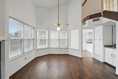 Unfurnished sunroom featuring visible vents, a wea
