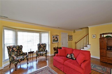 Living room with bay window.