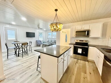 DINING ROOM AND SIDE DOOR LOOKIING FROM