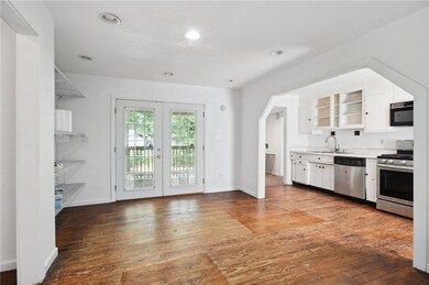 French doors lead to back porch