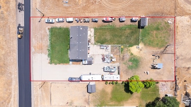 Aerial overview of property's location featuring property parcel outlined