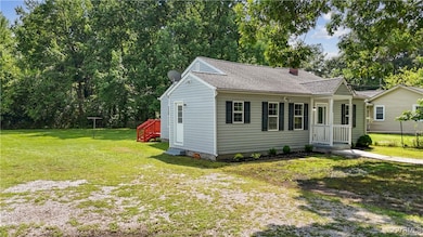 View of front of house with a shingled roof, a fro