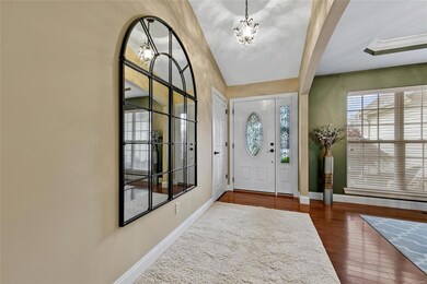 ENTRY FOYER OPENS TO THE DINING ROOM AND GREAT ROO