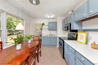 Kitchen with stainless steel appliances, stacked w