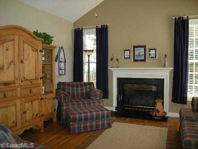 Den/Family/Great Room. Opens to breakfast area and kitchen!  Hardwood floors. Gas log fireplace. Cathedral ceilings. Wet bar.