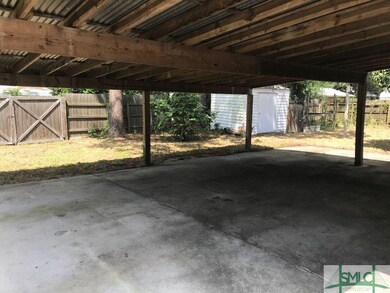 Over sized Double Carport.  Storage shed.