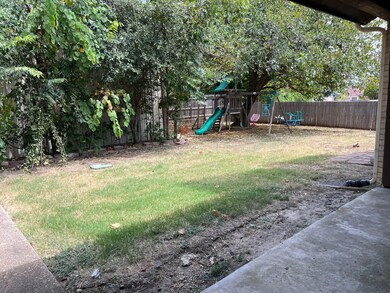 View of yard with a playground
