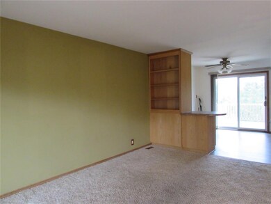 Custom built in shelf between living room and eat-