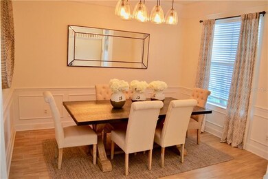 Formal dining with gorgeous new lighting!