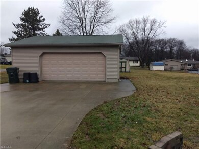 Twp plus car garage.  Access also through man door