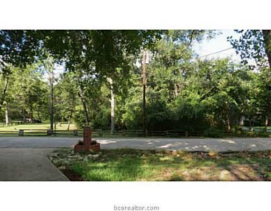 Land/Lot. Front the neighbor s driveway across the