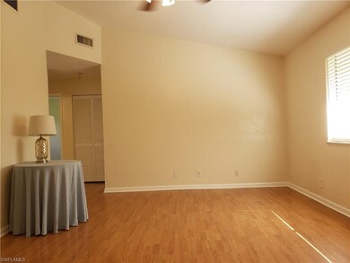 Living room with vaulted ceilings