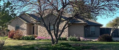 View of front of home featuring a front lawn