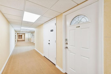 Front door and closet access to A/C handler and water heater in closet next door