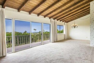 Expansive deck off back overlooks view, yard and p