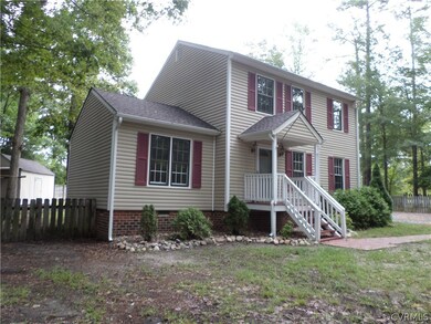 Another view of the updated home with vinyl siding