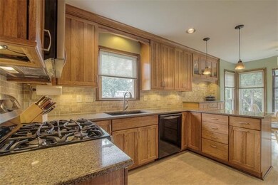 Lovely Granite Countertops and tile backsplash