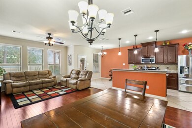 An amazing view that wonderfully captures the open floor plan which also allows for ease of conversation from one area to the next.