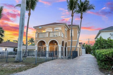 Front view of the house and long driveway during s