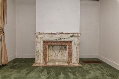 DECORATIVE FIREPLACE IN LIVINGROOM.