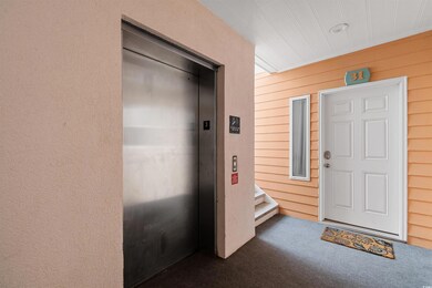 Property entrance featuring elevator