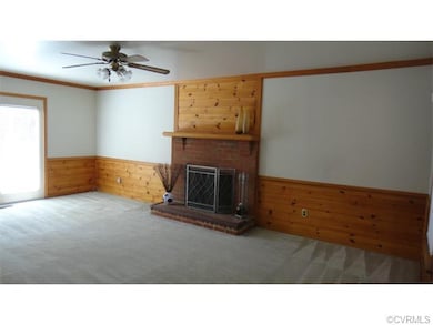 Living Room with wood burning fireplace for cozy e