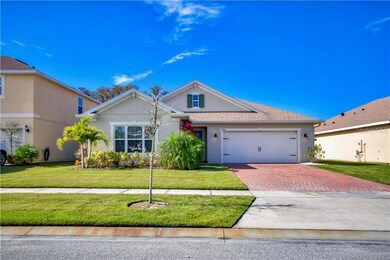 Front of Home with paver driveway.