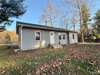 View of front facade featuring entry steps