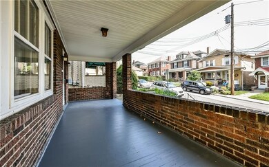 Large front porch perfect for sitting out on those