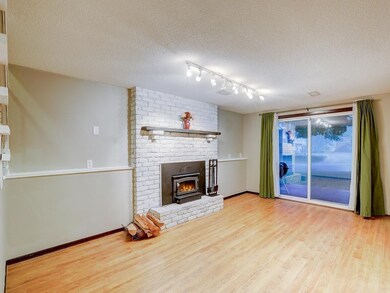 The basement is a walkout, and includes this wood-