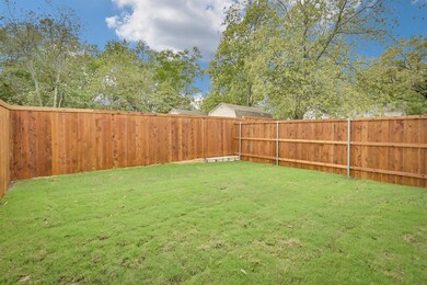 Small backyard surrounded by trees!