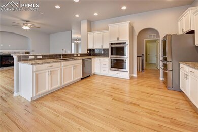 Large open kitchen with double ovens.