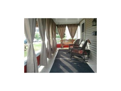 Patio/Deck. The front patio beckons you to sit and