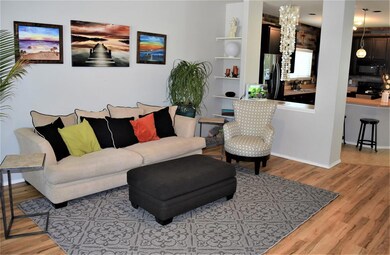 1st Floor Living Room adjacent to Kitchen and Dini