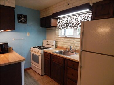 KITCHEN INCLUDES THE GAS STOVE, DISHWASHER AND REF