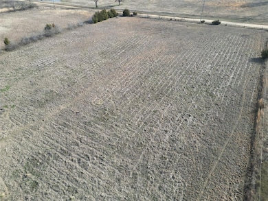 Exterior details featuring a rural view and carpet