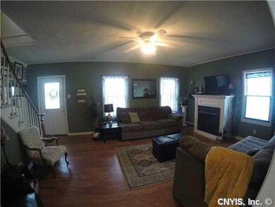 Living Room Large living room with natural gas fir