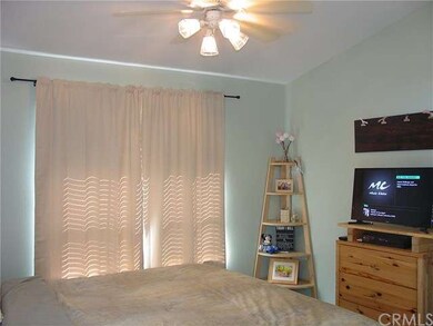 Master Suite has ceiling fan & soft pastel color p