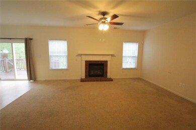 First floor family room has a gas fireplace with a